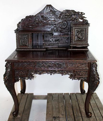 Heavily carved Japanese desk with dragons