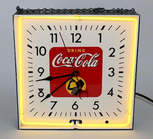 Vintage Coca-Cola neon clock in metal case