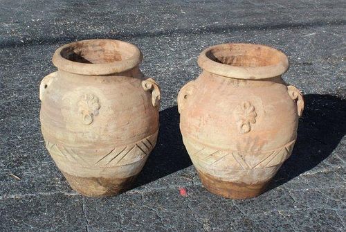 Pair of terra cotta olive oil jug style planters.