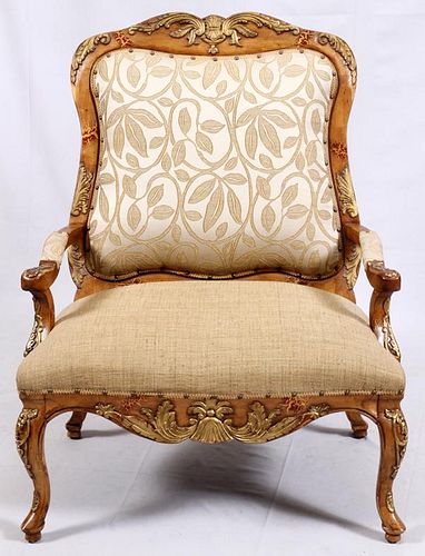 PAUL ROBERT CARVED WALNUT UPHOLSTERED ARM CHAIR