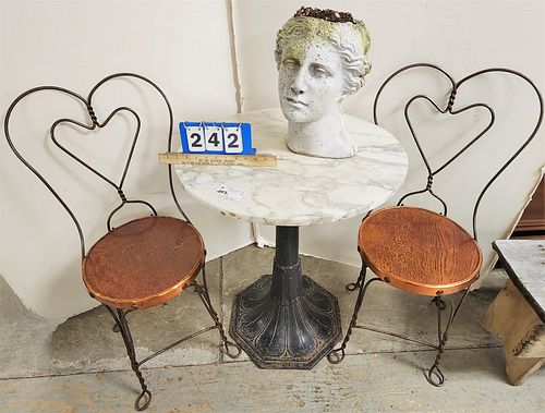 CAST IRON BASE MARBLE TOP TABLE 31"H X 24" DIAM W/ PR WIRE FRAME CHAIRS AND CLASSICAL HEAD PLANTER