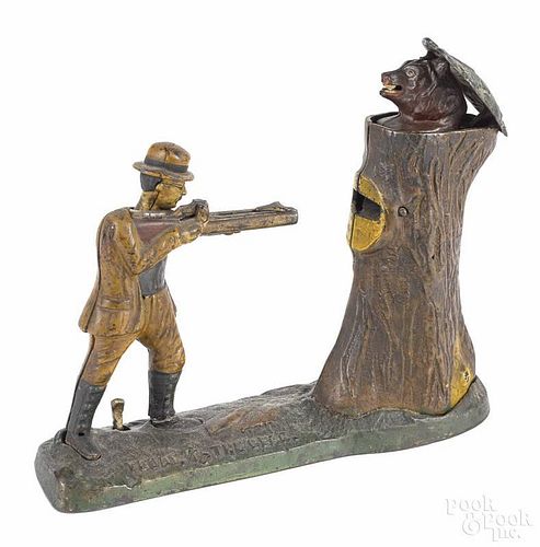 Cast iron Teddy and the Bear mechanical bank, manufactured by J. & E. Stevens Co.