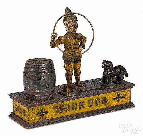 Cast iron Trick Dog type I mechanical bank, manufactured by Shepard Hardware Co.