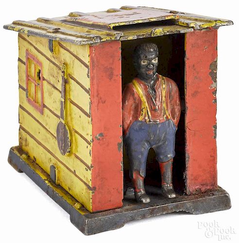 Cast iron cabin mechanical bank, manufactured by J. & E. Stevens Co.