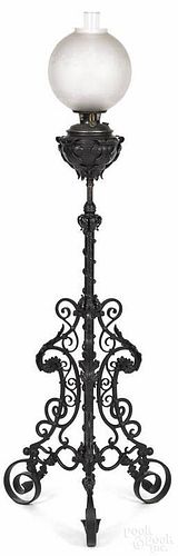 Bradley and Hubbard iron floor lamp, ca. 1900, with an etched glass shade, 64'' h.
