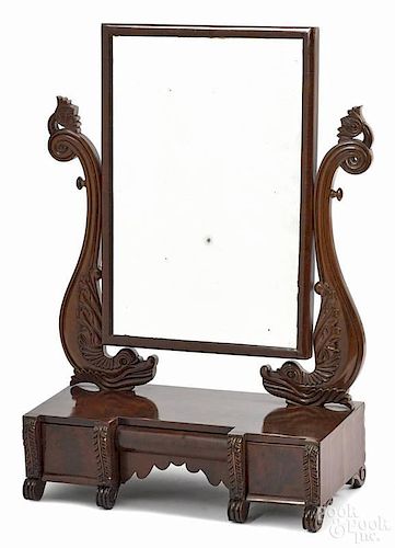 Empire mahogany shaving mirror, 19th c., with dolphin supports, 35 1/2'' h., 24'' w.