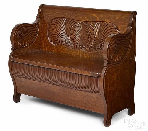 English oak hall bench, ca. 1900, with shell carved panels, 36 1/2'' h., 44'' w.