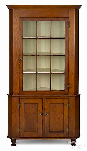 Pennsylvania pine corner cupboard, 19th c., in two parts, 82 1/2'' h. 44'' w.