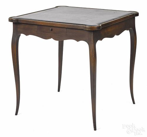 French mahogany games table, 20th c., with a leather top, 28 3/4'' h., 28 3/4'' w.