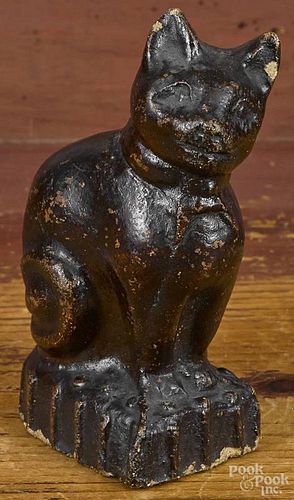 Earthenware figure of a seated cat, 19th c., 5'' h.
