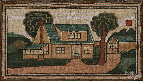 Hooked rug of a cottage, early 20th c., 22 1/2'' x 40''.