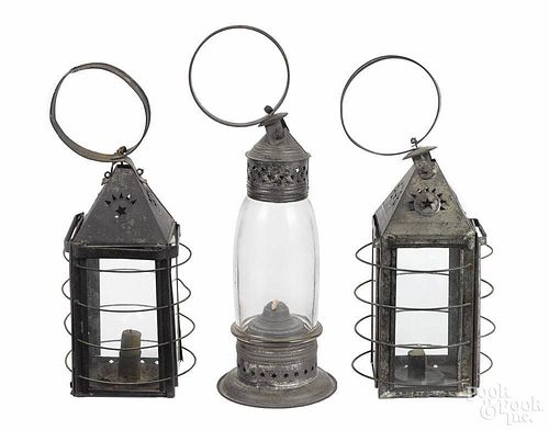 Three tin carry lanterns, 19th c., tallest - 17 1/2''.