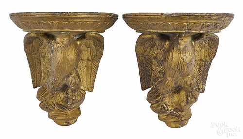 Pair of terra cotta eagle shelf brackets, ca. 1900, 10 1/2'' h., 9 3/4'' w.