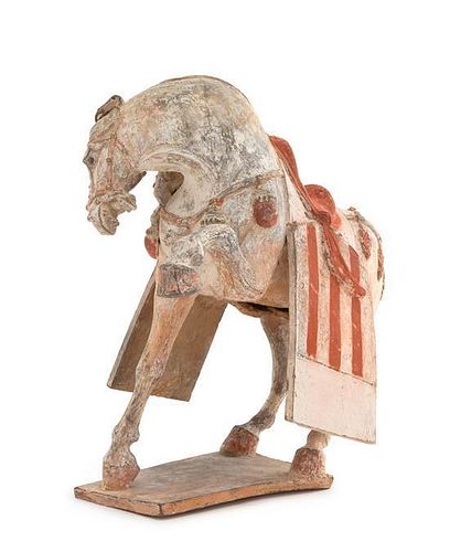 A Painted Pottery Figure of a Prancing Horse Height 12 1/2 inches.