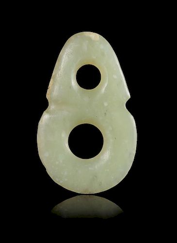 A Small Celadon Jade Pendant Height 1 3/4 inches.