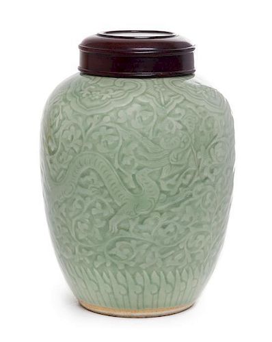 A Celadon Glazed Porcelain Jar Height 9 1/2 inches.