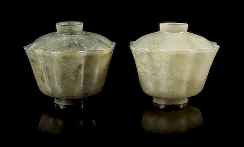A Pair of Carved Celadon Jade Floriform Covered Bowls Height of taller 3 1/2 inches.