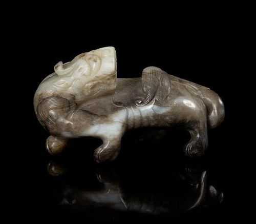 A Black and White Jade Figure of a Qilin Length 4 inches.