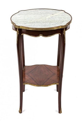 A Pair of Louis XV Style Gilt and Marble Top Gueridons Height 27 1/2 x diameter 17 inches.