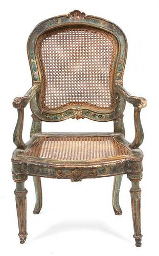 A Louis XV Style Parcel Gilt Fauteuil Height 39 1/2 inches.