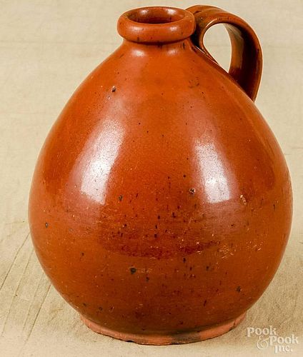 New England ovoid redware jug, early 19th c., 8 1/4'' h.