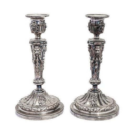 A Pair of Louis XVI Style Silver Plate Candlesticks Height 12 inches.