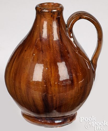 Small New England redware jug, 19th c.