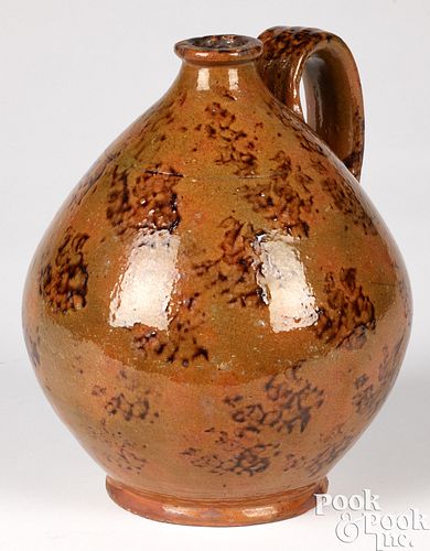Redware ovoid jug, 19th c.