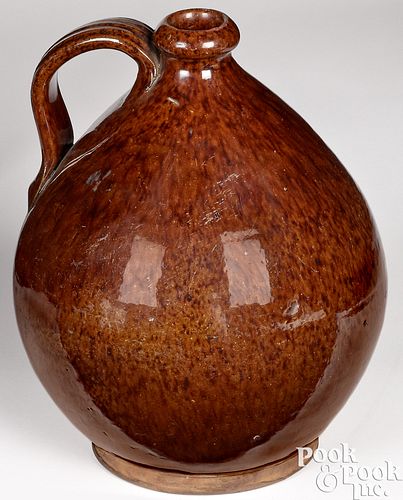 Redware ovoid jug, 19th c.