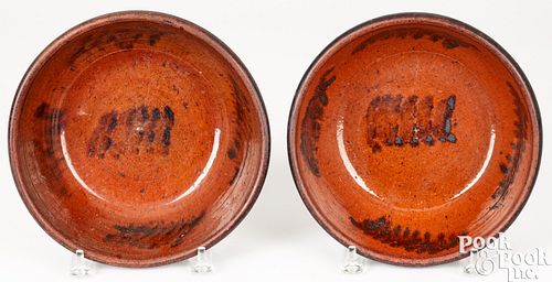 Pair of Pennsylvania redware bowls, 19th c.