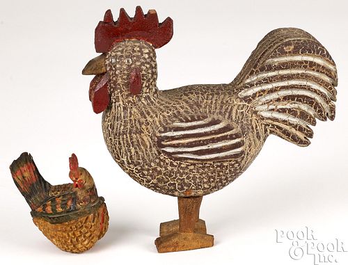 Two folk art carved and painted chickens
