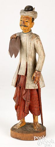 Carved and painted trade figure
