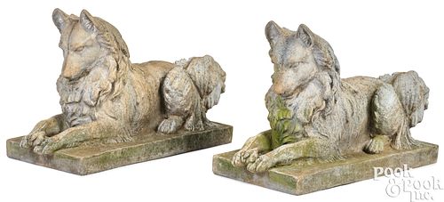 Pair of J. W. Fiske cast zinc recumbent dogs