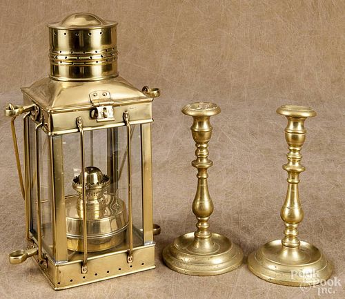 Pair of brass candlesticks, ca. 1800, 9 1/2'' h., together with a contemporary brass lantern, 15'' h.
