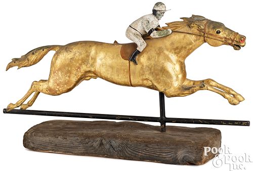 Full-bodied copper jockey and horse weathervane