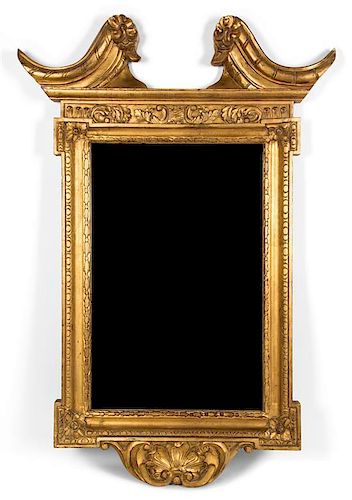 A Georgian Style Carved Giltwood Mirror 51 1/2 x 34 1/4 inches.