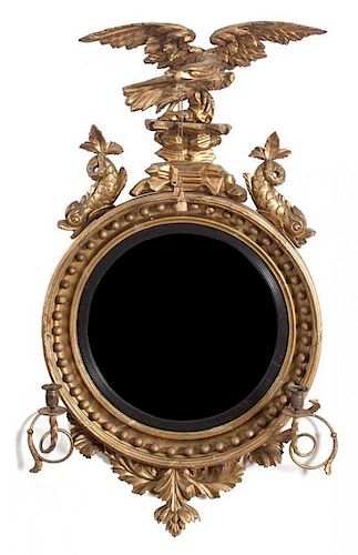 An English Regency Convex Mirror Height 48 x 26 inches.