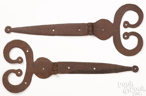 Pair of wrought iron ram's horn strap hinges