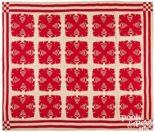 Red and white appliqué Hawaiian quilt