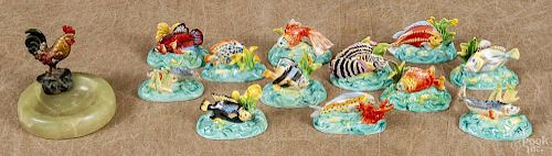 Set of twelve Dresden place card holders, 20th c., together with a cold painted bronze rooster