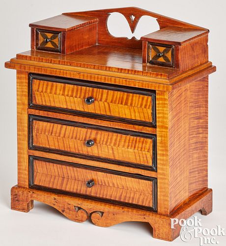 Miniature tiger maple chest of drawers, 19th c.
