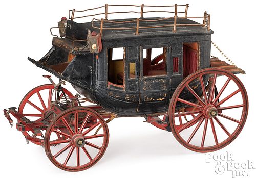 Miniature painted wood and leather carriage