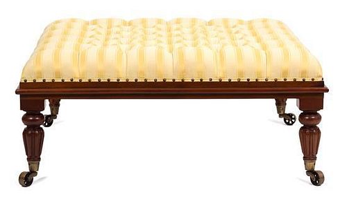 A Regency Mahogany Button-Tufted Upholstered Ottoman Height 16 x width 36 x depth 36 inches.