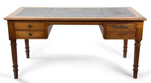 An American Oak Writing Desk Height 30 x width 62 1/2 x depth 31 inches.