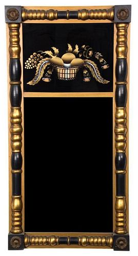 An American Empire Ebonized and Gilt Split Baluster Mirror 30 1/2 x 15 1/2 inches.