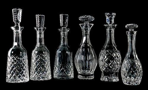 A Group of Six Waterford Glass Decanters Height of tallest 13 1/4 inches.