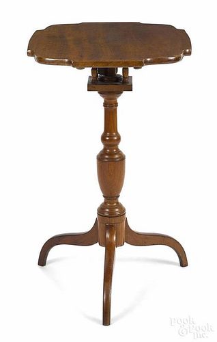 Federal walnut candlestand, ca. 1810, with a birdcage support, 29'' h., 17 1/2'' w., 22 3/4'' d.
