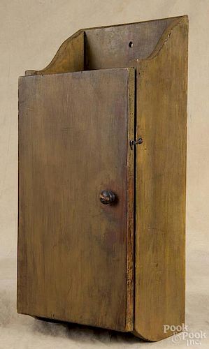 Pennsylvania painted pine hanging cupboard, 19th c., 25 1/4'' h., 10 1/2'' w.