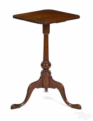 Federal cherry candlestand, ca. 1800, with a suppressed ball standard, 27'' h., 15 1/2'' w.