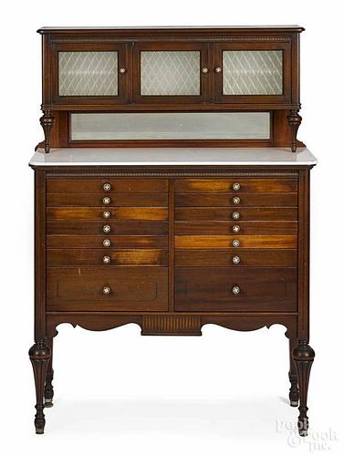 American Cabinet Company mahogany dentist's cabinet, early 20th c., 58'' h., 38'' w.